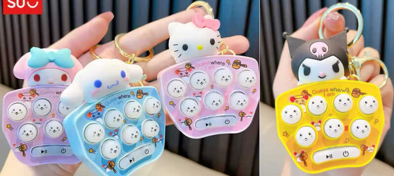 Брелок C 70879 (50) ЦІНА ЗА 12 ШТУК В БЛОЦІ, герой, металева фурнітура, підсвічування, звуки, на батарейках, пальчикова гра, в пакеті